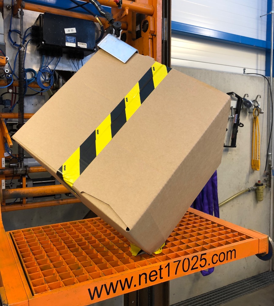 Transport box in drop-test equipment in our laboratory
